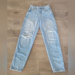 Women's ripped mom jeans.